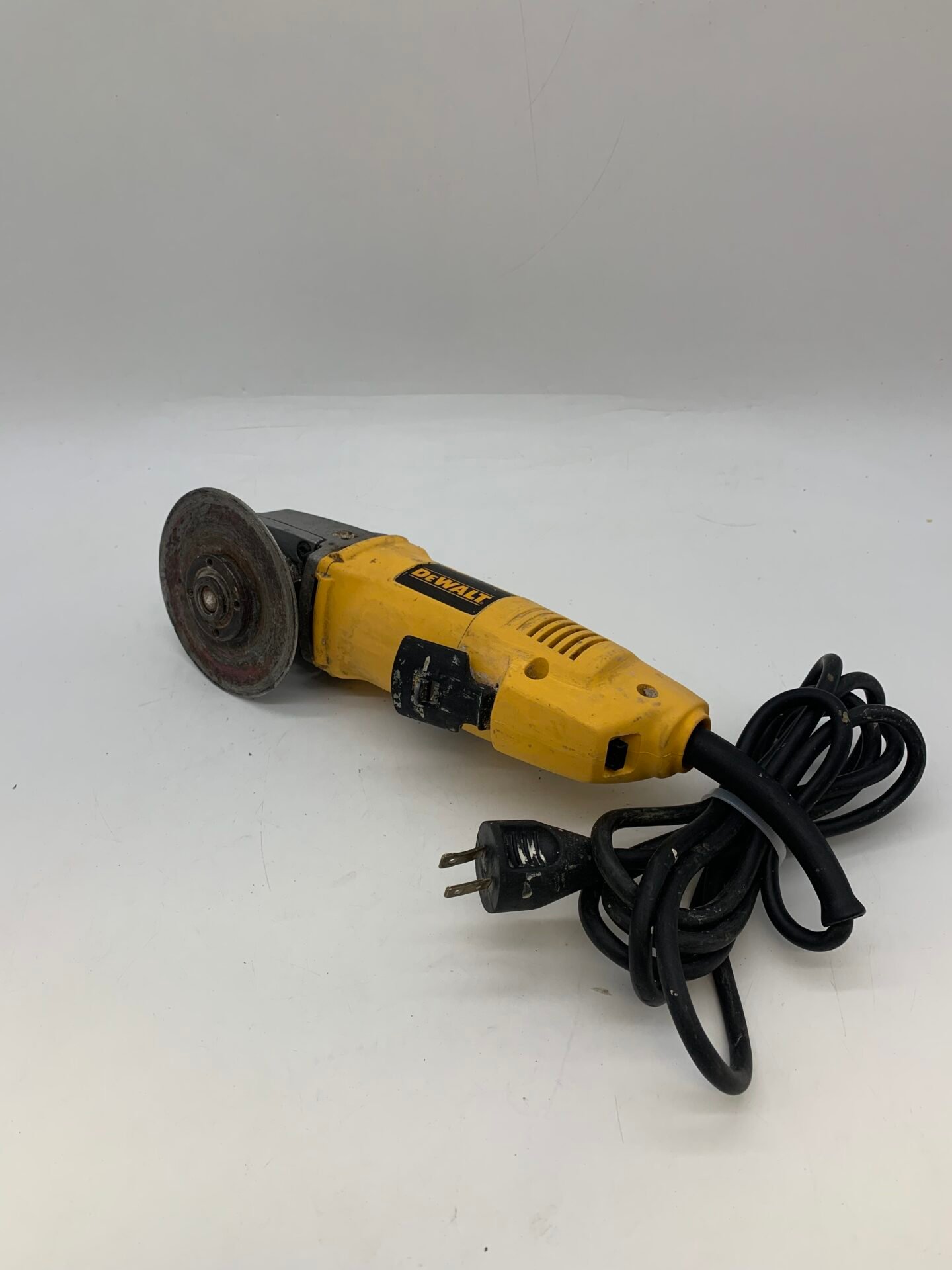 IMG_5950 DEWALT DW402 Professional 4-1/2 Inch Angle Grinder Working - Image 1