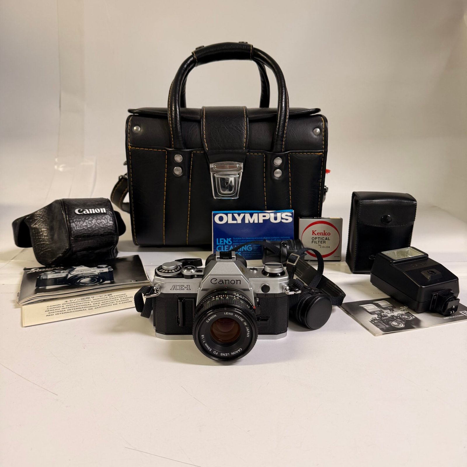 IMG_6062 Canon AE-1 35mm SLR Film Camera w/ FD 50mm f/1.8 Lens Flash Bag Tested Kit - Image 1