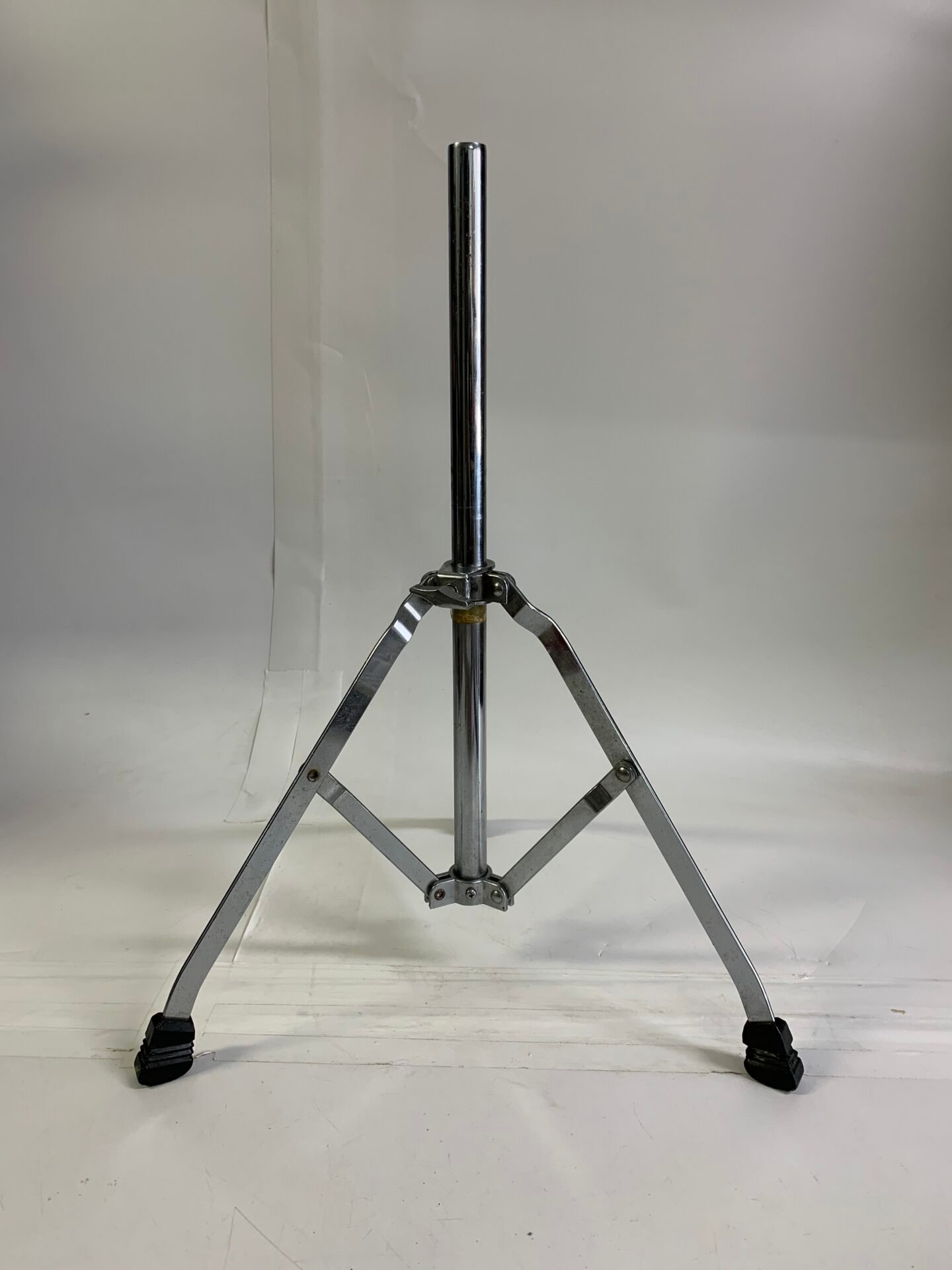IMG_6131 Japanese-made drum hardware stand featuring a chrome finish, tripod base, and adjustable construction. - Image 1